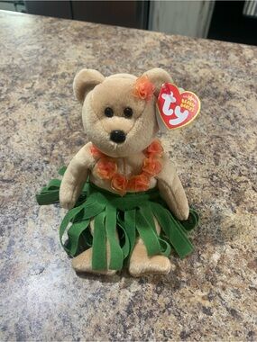 Alana Ty Hula Bear Plush with Green Skirt and Orange Lei